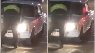 Sürücü yol polisini avtomobilinin kapotunun üstündə “gəzdirdi”  - VİDEO