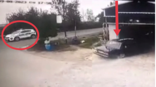 Yol polislərindən qaçan sürücü maşını həyətə salıb gizlətdi - VİDEO