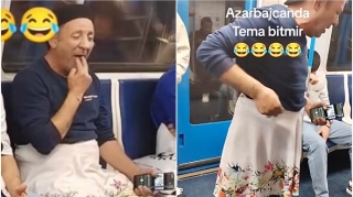 Metroda yaşlı kişi geyimi və hərəkətləri ilədiqqət çəkdi - VİDEO