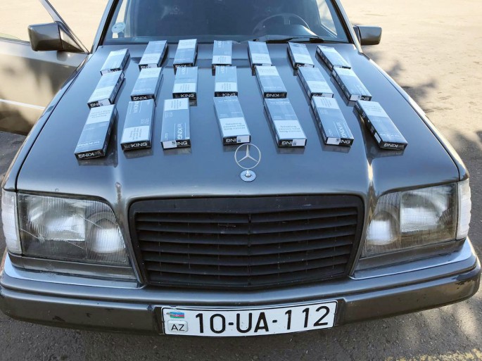 "Mercedes" və "Opel”dən qanunsuz 7200 ədəd siqaret aşkarlanıb - FOTO
