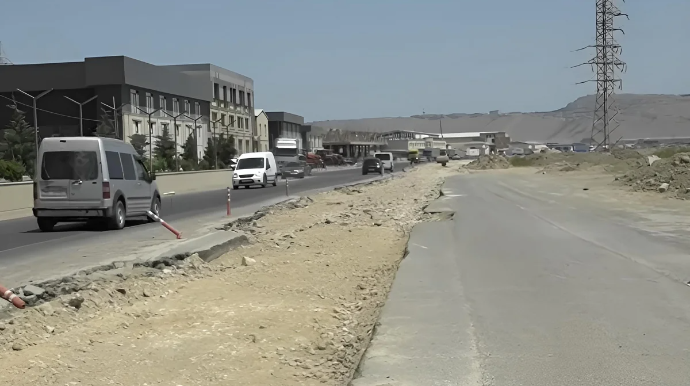 Lökbatanda təhlükə saçan yol: Aylar əvvəl qazılan ərazi asfaltlanmır - VİDEO 
