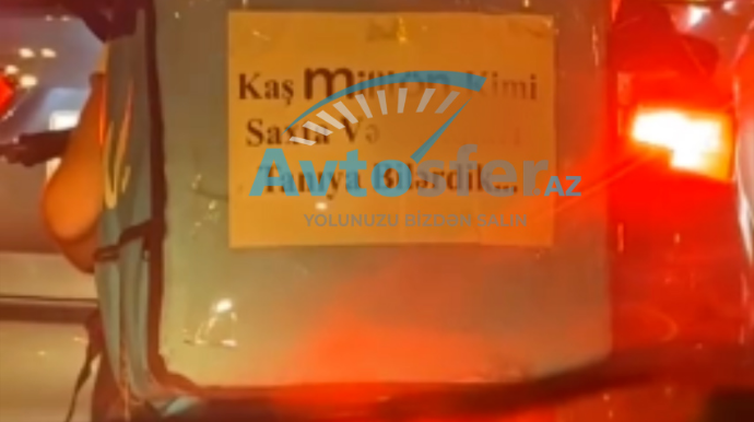 Moto kuryerin çantasına yazdığı “fəlsəfi” cümlə tənqid edildi - VİDEO 