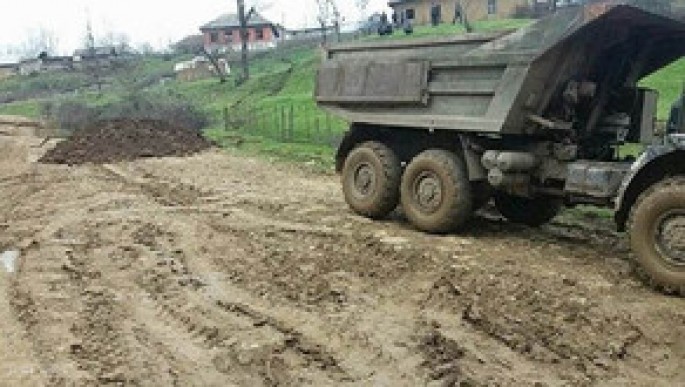 Sürüşmə nəticəsində çökmüş kənd yolu bərpa edilib - FOTO