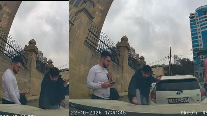 Park edilən maşının buferinə ayağını qoyub şalvarını düzəltdi - ANBAAN VİDEO 