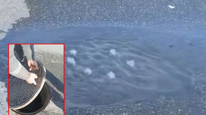 Xətaidə kanalizasiya daşdı, yolu çirkab su basdı - VİDEO