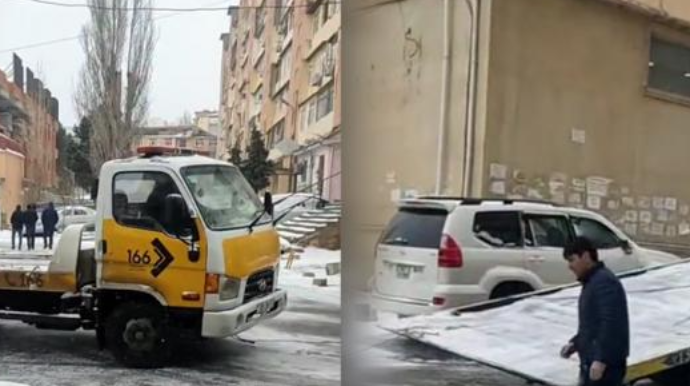 Avtomobili götürməyə gələn evakutor qarda ilişdi, onun üçün də yeni evakuator gəldi - VİDEO 