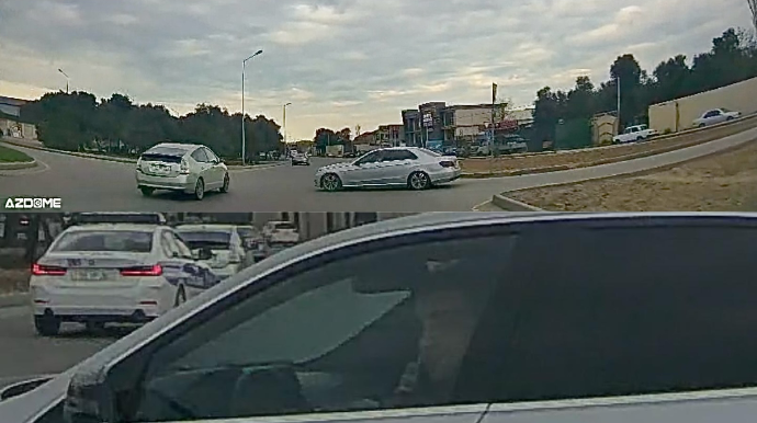 Telefonla danışan sürücü baş yoldan gələnlərin yolunu kəsdi – 75-AF-858   - VİDEO