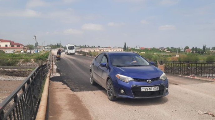 Qubada qəzalı vəziyyətə düşən körpü bərpa olundu   - FOTO