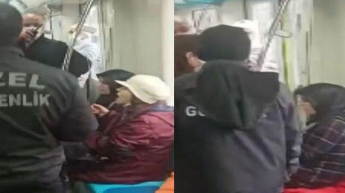 Maska taxmaqdan imtina edən qadınları qatardan zorla düşürdülər - VİDEO 