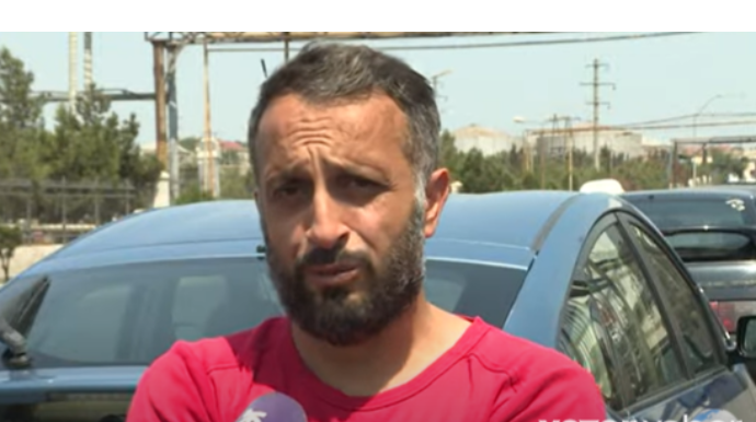 Avtomobilin üstünə binadan ətir qabı atılıb, maşına ziyan dəyib - VİDEO