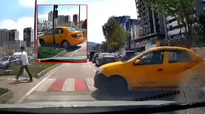 Taksi sürücüsü yolu qısaltmaq üçün piyada keçidindən istifadə etdi - VİDEO 