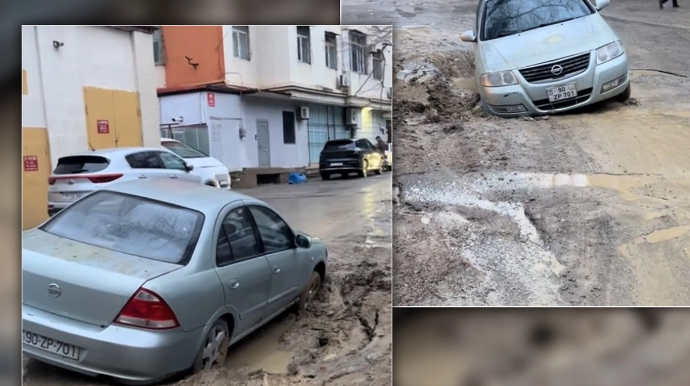 7-ci mikrorayonda yol çöküb - Maşın batdı - VİDEO