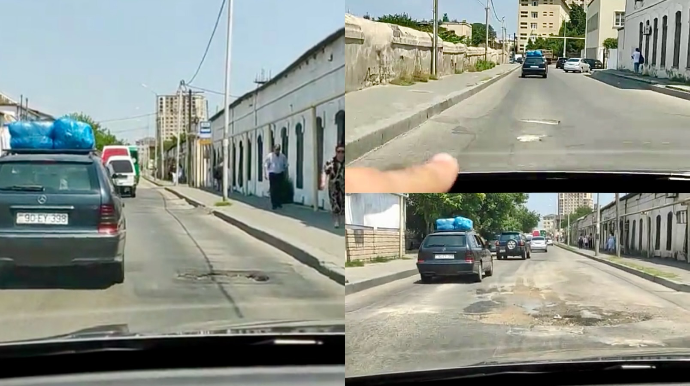 Bu yolda çuxurlar sürücüləri çətin vəziyyətə salır   - VİDEO