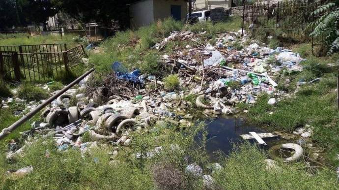 Bakıda qəbiristanlıq zibilxanaya çevirilib - FOTO
