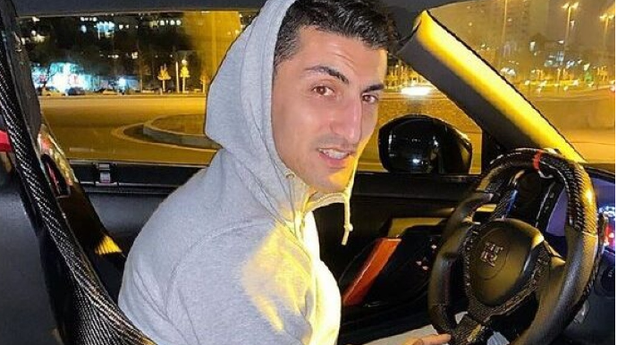 Araz Abdullayev təkər qaraldan gənci təhqir edib vurdu, sonra üzr istədi - VİDEO