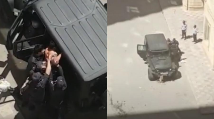 Yasamalda qarşıdurma: Balkonlardan polislərə zibil atdılar  - VİDEO