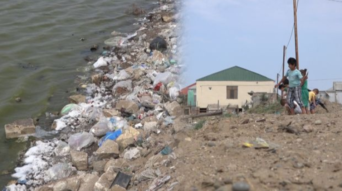 Bakıda eşidilməyən səs, tapılmayan çarə: Üfunət qoxulu yollardan keçmək macəraya çevrilib - VİDEOREPORTAJ 