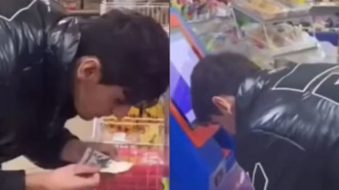 Pulun üzərinə tüpürərək ödəniş edən gənc polisə çağırıldı - VİDEO 