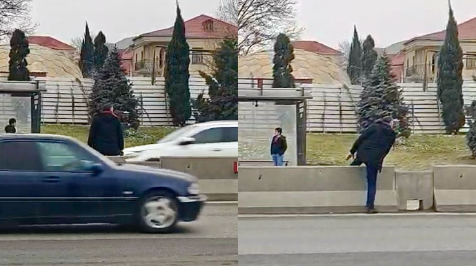 Çıxılmaz vəziyyətə düşən piyada ayrıcı betonun üzərindən  yolu keçdi   - VİDEO