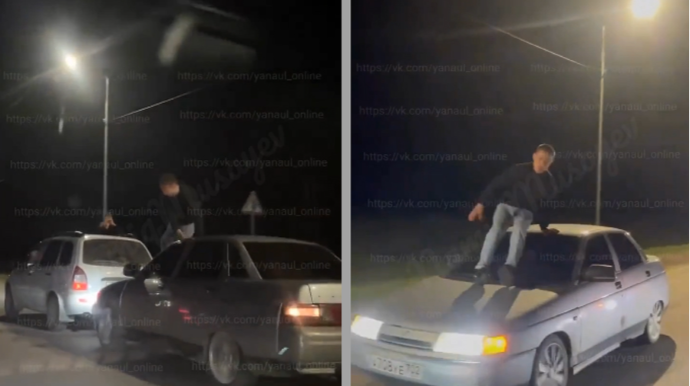 Maşınların üzərində gəzən adam kameraya düşdü - VİDEO 