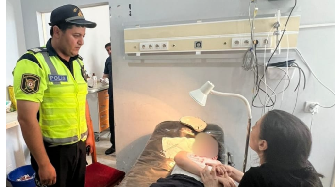 Yol kənarında it uşağa hücum etdi, köməyə yol polisi gəldi   - FOTO