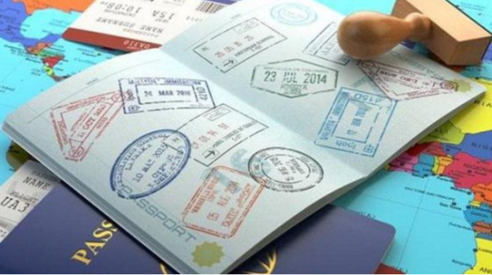 Pasport fotoşəkilinizdə niyə gülümsəyə bilməzsiniz? - Cavab sizi şoka salacaq 