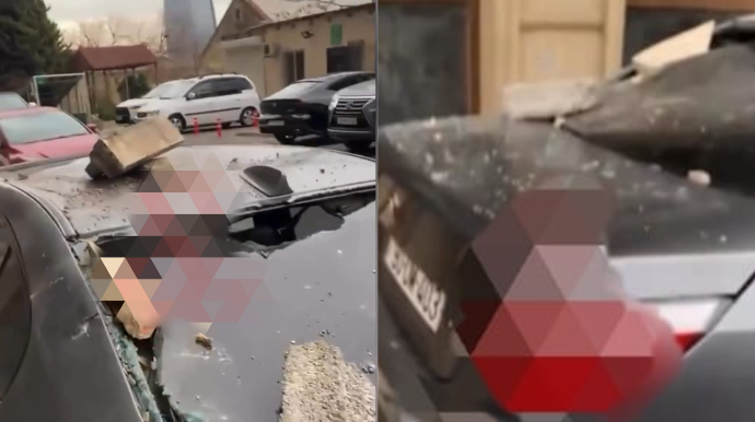 Binadan qopan daş maşının üzərinə düşdü; komendat məsuliyyətdən yayınır - VİDEO  