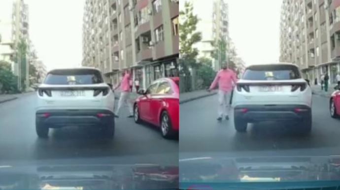 İkinci cərgədə park edib yolu kəsən sürücü əl-qol atdı - VİDEO