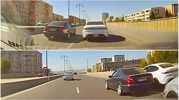 Yolun ortasında dayanıb söhbət edən sürücülər hərəkətə mane oldular - VİDEO