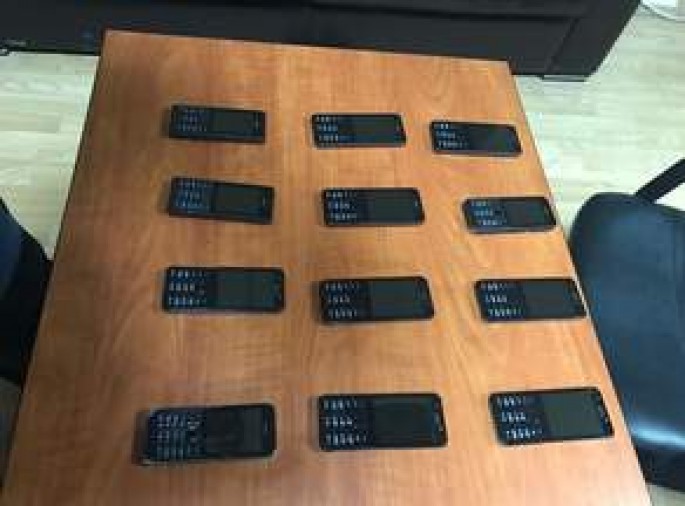 Avtomobildən 12 mobil telefon aşkar olundu - FOTO