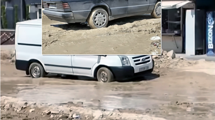 "Dizə kimi palçığın içində evə gedirik" – Bakıda yol problemi - VİDEO 