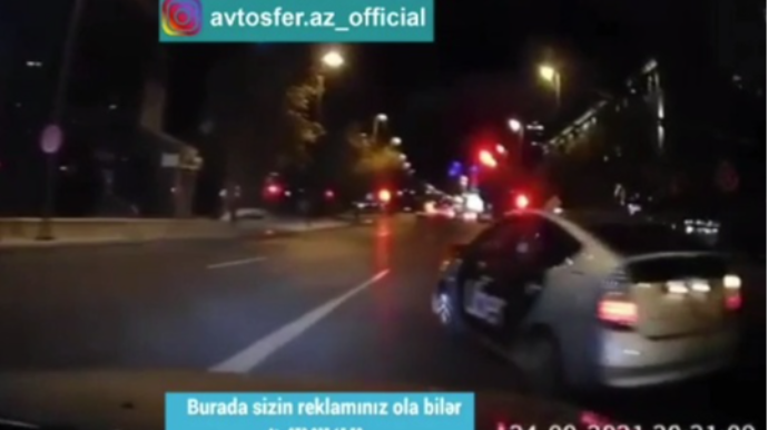 Qəza şəraiti yaradıb özünü haqlı bilən taksi sürücüsü  - VİDEO