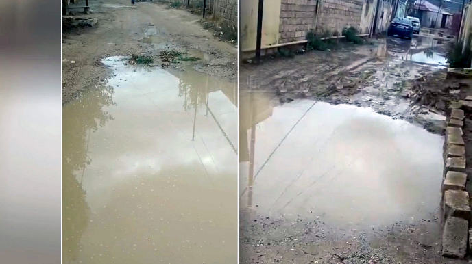 Bakıda yol gölməçəyə çevrildi - VİDEO