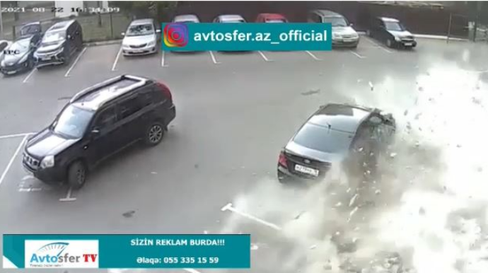 18-ci mərtəbədə uçan divar maşının üstünə düşdü və... - VİDEO