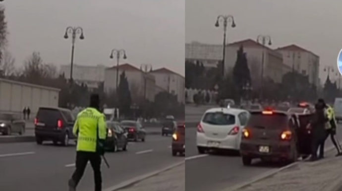 Bakıda yol polisi trasda maşından düşən qadın sərnişinə görün nə etdi - VİDEO 