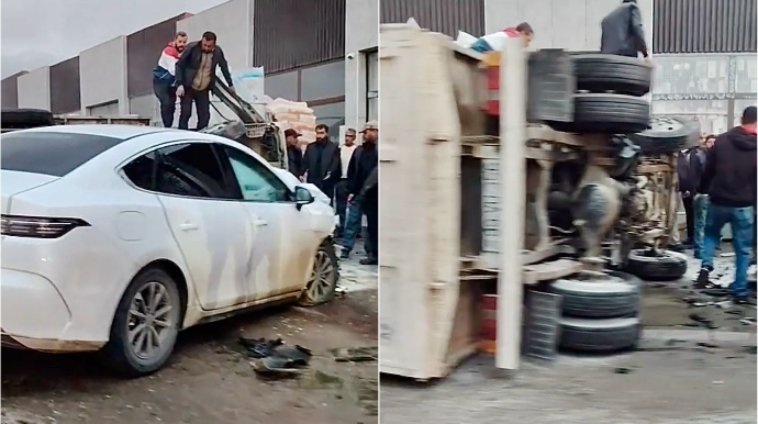 Binəqədidə “BYD” sürücüsü yük maşınını vurub aşırdı   - VİDEO