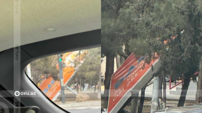 Paytaxtda güclü külək nəhəng reklam lövhəsini aşırdı  - FOTO