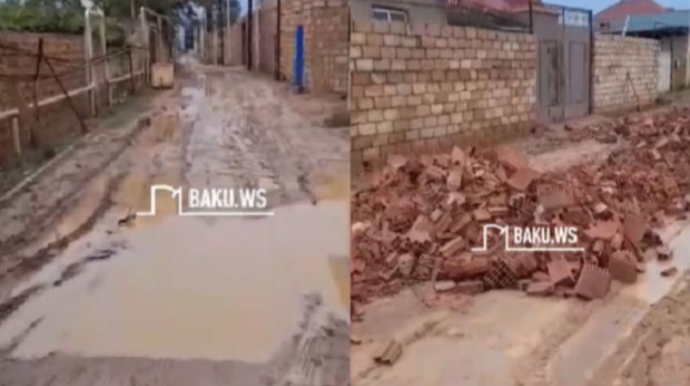 Sabah Bakının bir rayonunda uşaqlar məktəbə palçıqlı yolla gedəcəklər  - VİDEO