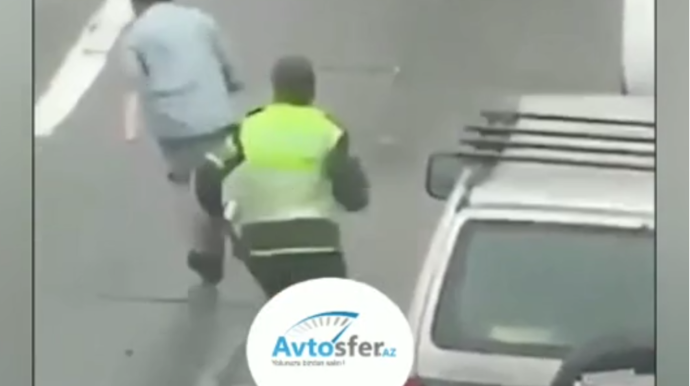 Avtomobili qarət etməyə çalışan oğru polisə yaxalandı  - VİDEO
