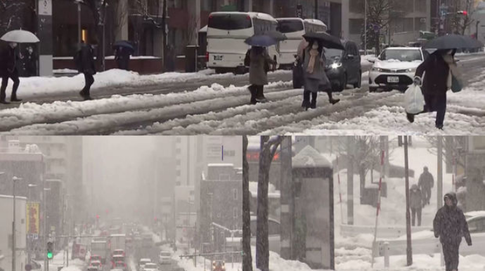 Из-за последствий сильных снегопадов в Японии погибли несколько человек  - ВИДЕО