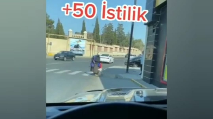 Yaşlı qadın 50 dərəcə istidə küçə süpürür: "JEK" müdürü qanunu niyə pozur?  - VİDEO