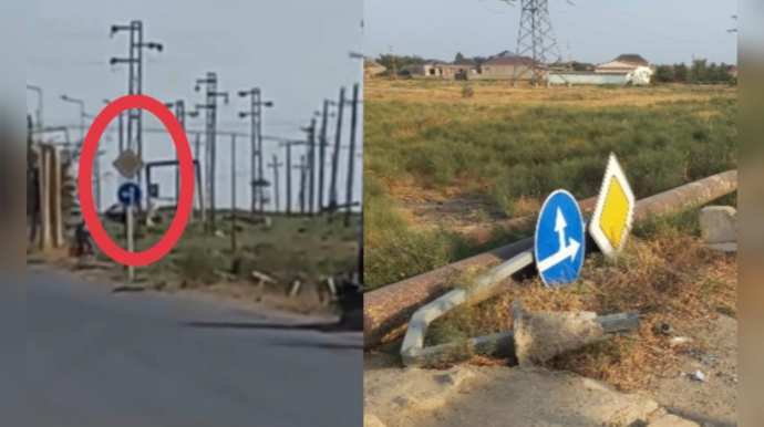Qəza zamanı aşan yol nişanları əvvəlki yerinə bərpa edildi - VİDEO