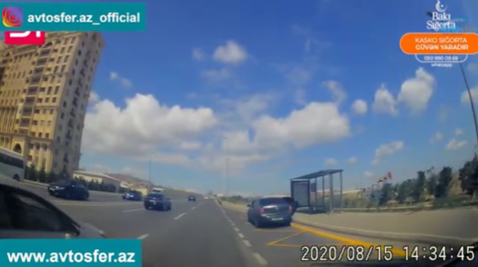 Qırmızıda keçib avtobus dayanacağını zəbt edən taksi sürücüsü - 99 PB 776 - VİDEO
