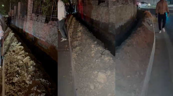 Kanalizasiya xətlərinin təmirinə görə vətəndaşlar avtobusu yolun ortasında gözləyir - VİDEO