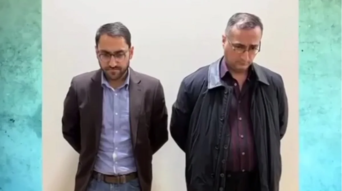 SSRİ bayraqları ilə yürüş etməyə cəhd göstərənlərin məhkəməsi başladı 