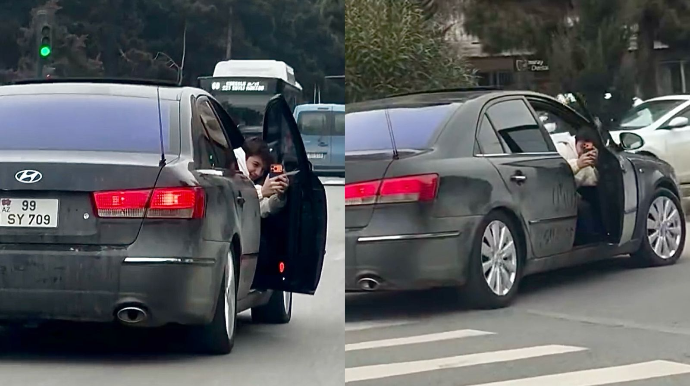 Günəşlidə ölümə meydan oxuyan sərnişin: Hərəkətdə olan avtomobilin qapısını açıb… - VİDEO