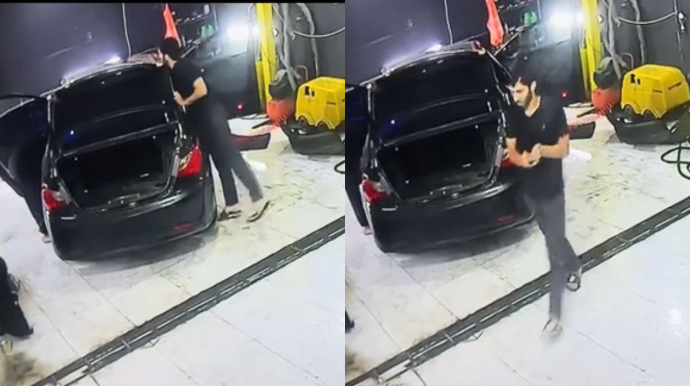 Avtoyuma məntəqəsində telefon oğurladı; kameraya düşdüyünü unutdu - VİDEO