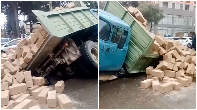 Bakıxanovda yol çökdü, daşla dolu yük maşını aşdı    - VİDEO