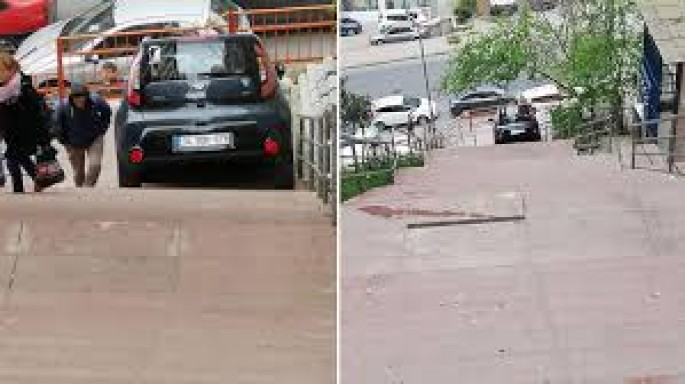 Qadın avtomobili ilə pilləkənlərdə qaldı - VİDEO