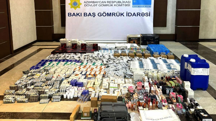 Əlli litr ətiri gömrükdən gizlin keçirmək istədilər